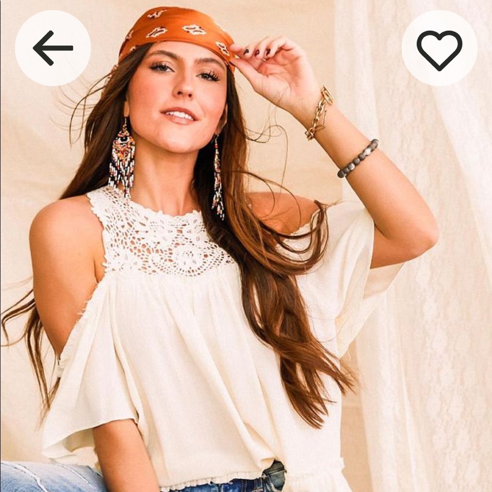 Gimmicks cream off the shoulder top